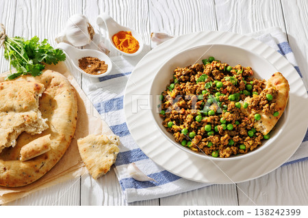 keema matar with minced meat, peas and naan 138242399