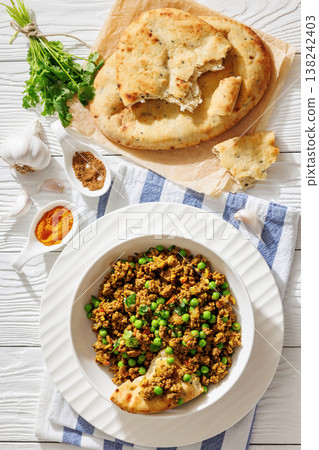 keema matar with minced meat, peas and naan 138242403