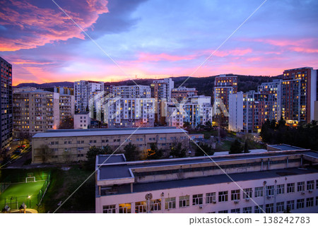 Dramatic vibrant sunset over apartment buildings in Saburtalo district in Tbilisi, Georgia Dramatic vibrant sunset over apartment buildings in Saburtalo district in Tbilisi, Georgia 138242783