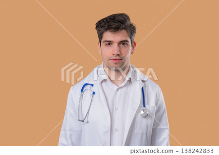 Caring handsome doctor looks at camera, listening with empathy and understanding 138242833