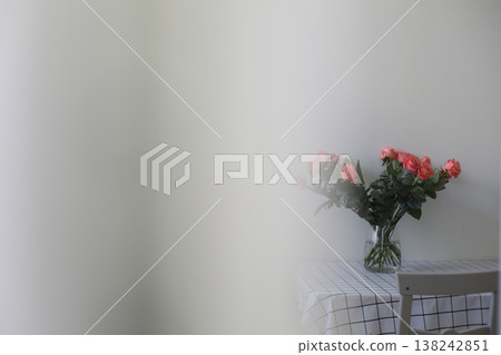 flowers in a vase. Home decoration and interior. Details of still life in the home interior of living room. Cozy spring concept.  138242851