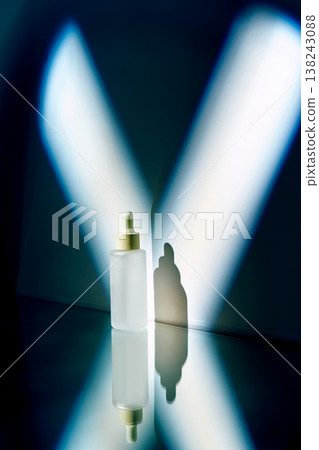 Skincare serum bottle reflecting futuristic cosmetic innovation Skincare serum bottle reflecting futuristic cosmetic innovation 138243088