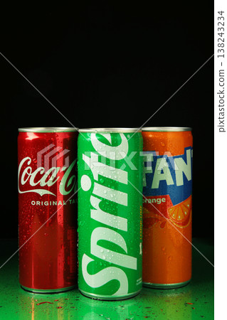 Mykolaiv, Ukraine - March 25, 2026 - Can of Coca-cola , Fanta and Sprite on dark green background. Vertical photo Mykolaiv, Ukraine - March 25, 2026 - Can of Coca-cola , Fanta and Sprite on dark green background. Vertical photo 138243234