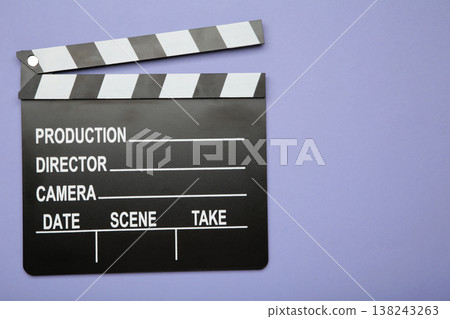 One movie clapper on purple background. Film industry One movie clapper on purple background. Film industry 138243263