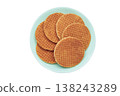 Dutch waffles stroopwafel syrup waffle caramel waffle on plate isolated on white background 138243289