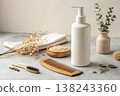 Natural hair care set with shampoo bottle comb and herbal ingredients on neutral background 138243360