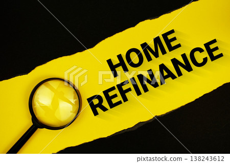 Home Refinance text on yellow with black paper torn ripped and magnifying glass 138243612