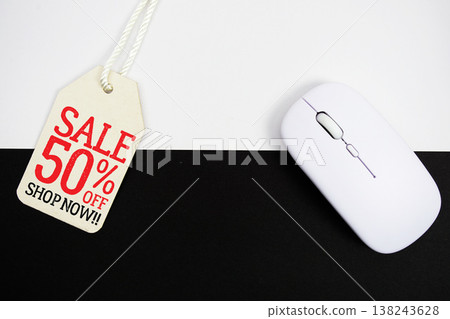 Price tag with Sale 50% off and wireless mouse on white and black background Price tag with Sale 50% off and wireless mouse on white and black background 138243628