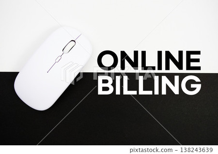 Online Billing text and wireless mouse on white and black background Online Billing text and wireless mouse on white and black background 138243639