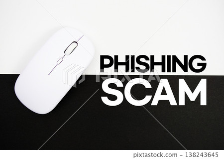 Phishing Scam text and wireless mouse on white and black background 138243645