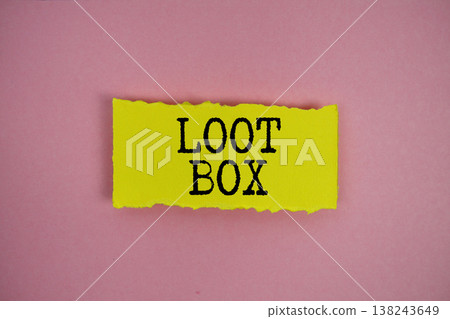 Loot Box text written on paper rip Loot Box text written on paper rip 138243649