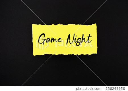 Game Night text written on paper rip Game Night text written on paper rip 138243658