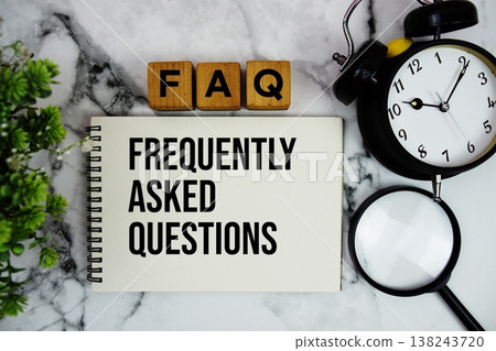 FAQ Frequently Asked Questions text with alarm clock and magnifying glass on marble background FAQ Frequently Asked Questions text with alarm clock and magnifying glass on marble background 138243720