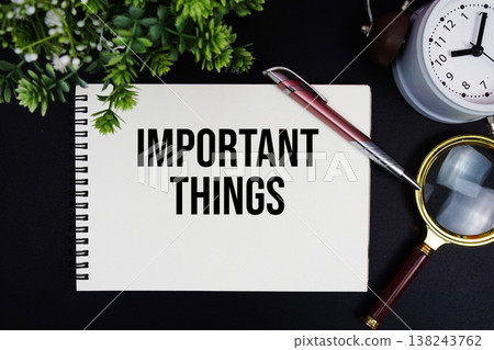 Important Things text with alarm clock and magnifying glass Important Things text with alarm clock and magnifying glass 138243762