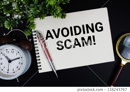 Avoiding Scam! text with alarm clock and magnifying glass Avoiding Scam! text with alarm clock and magnifying glass 138243767