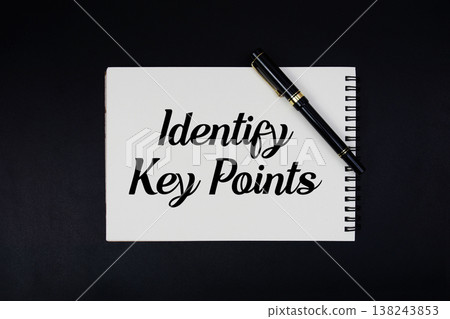 Identify Key Points text written on notepad 138243853