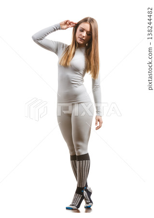 Fit female wearing thermoactive underwear 138244482