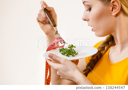 Sad young woman being on diet Sad young woman being on diet 138244547