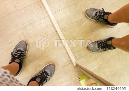 Man wearing sport shoes and mirror Man wearing sport shoes and mirror 138244695