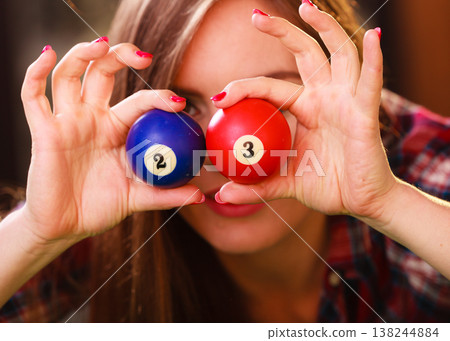Young woman having fun with billiard. Young woman having fun with billiard. 138244884