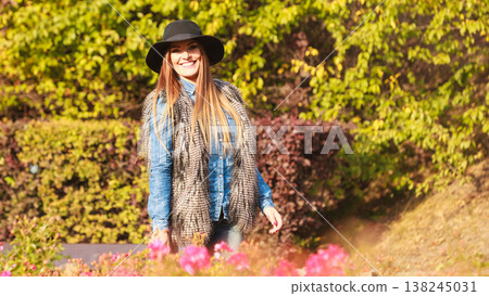 Cheerful woman having fun outdoors 138245031
