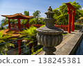 Monte Palace tropical garden with red pagoda, lakes and traditional buildings above the city of Funchal, popular tourist destination in Madeira island, Portugal 138245381