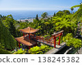 Monte Palace tropical garden with red pagoda, lakes and traditional buildings above the city of Funchal, popular tourist destination in Madeira island, Portugal 138245382