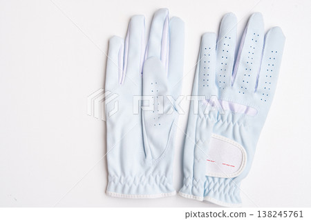 light blue horse riding gloves for Equestrian sports at white background 138245761