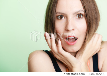 Surprised shocked woman face with open mouth Surprised shocked woman face with open mouth 138246548