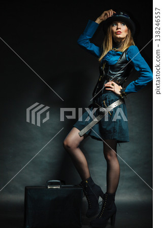 Steampunk girl with retro bag. 138246557
