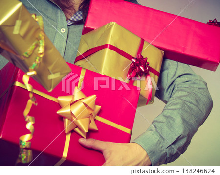Male hands with many presents gift boxes Male hands with many presents gift boxes 138246624