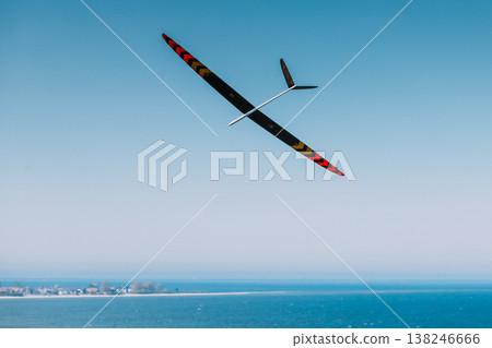 RC soaring plane on blue sky 138246666