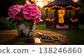 Pink hydrangea blooms in a rustic vase with garden shears on a mossy table 138246860