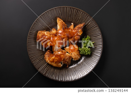 Deep-fried chicken breast with spicy sauce Deep-fried chicken breast with spicy sauce 138249144