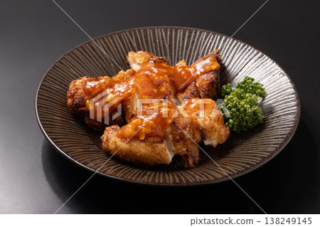 Deep-fried chicken breast with spicy sauce Deep-fried chicken breast with spicy sauce 138249145