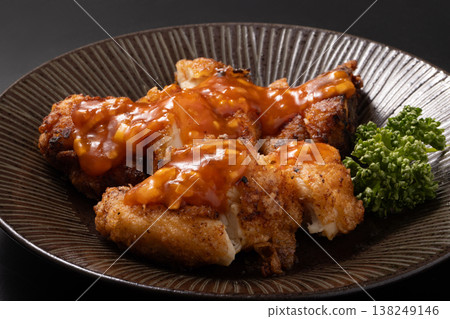 Deep-fried chicken breast with spicy sauce Deep-fried chicken breast with spicy sauce 138249146