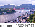 Morning view of the Ondo Bridge from Kurahashi Island and the ferry boat Asahiyo Maru 2 passing through the Ondo Strait, Kure City, Hiroshima Prefecture. Morning view of the Ondo Bridge from Kurahashi Island and the ferry boat Asahiyo Maru 2 passing through the Ondo Strait, Kure City, Hiroshima Prefecture. 138249743