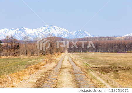 A simple, unassuming landscape in Nakashibetsu, Hokkaido, in early spring, slightly shrouded in mist. A simple, unassuming landscape in Nakashibetsu, Hokkaido, in early spring, slightly shrouded in mist. 138251071