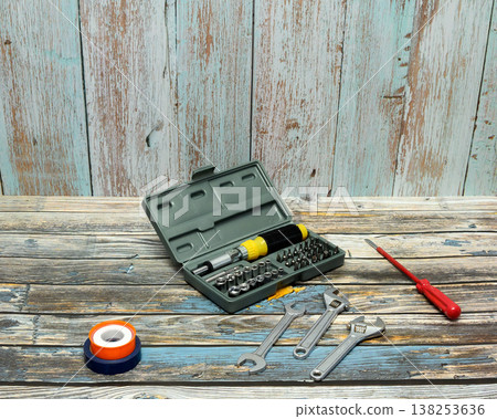 set of bits and sockets in an open grey plastic case set of bits and sockets in an open grey plastic case 138253636
