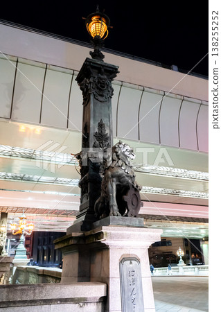 Nihonbashi Bridge (Important Cultural Property), the starting point of the Tokaido Road, with its lion statues and Tokyo City emblem, is illuminated. Nihonbashi Bridge (Important Cultural Property), the starting point of the Tokaido Road, with its lion statues and Tokyo City emblem, is illuminated. 138255252