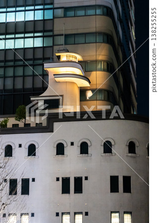 Nihonbashi Daiya Building (Mitsubishi Warehouse Edobashi Warehouse Building): A masterpiece of modern architecture inspired by a ship's hull, illuminated at night. 138255255
