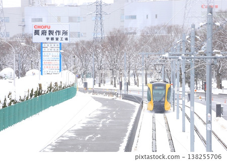 A streetcar running through the snow: Utsunomiya Light Rail 138255706