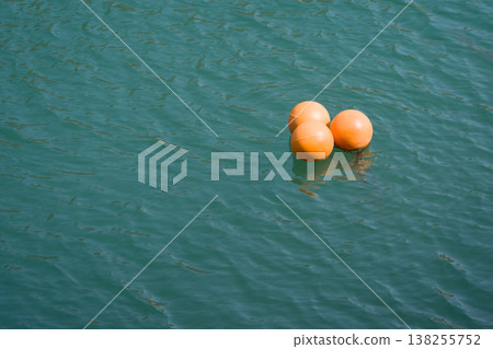 Buoy floating in the lake 138255752