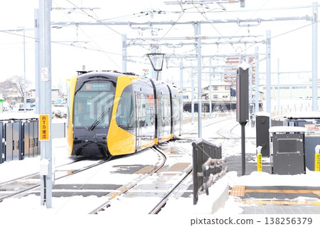 Utsunomiya Hiraishi Station "Light Rail and Snow Scenery" 138256379
