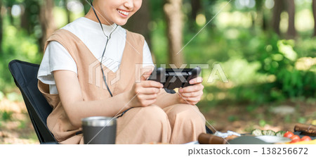 Couple and children playing games at family camp (Family/Travel) Couple and children playing games at family camp (Family/Travel) 138256672