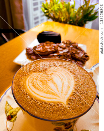 Cups of coffee decorated with a heart Cups of coffee decorated with a heart 138256808