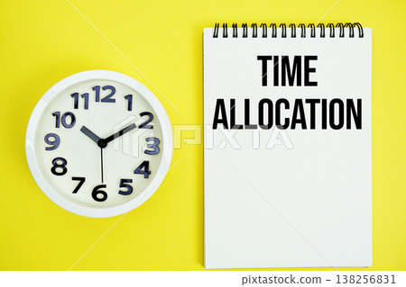 Time Allocation text with alarm clock flat lay on yellow background 138256831