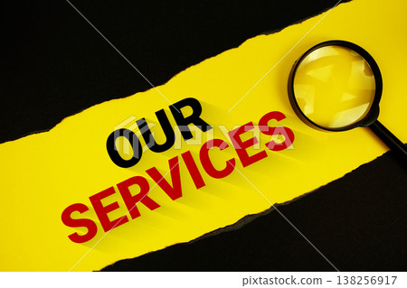 Our Services text on yellow with black paper torn ripped and magnifying glass Our Services text on yellow with black paper torn ripped and magnifying glass 138256917