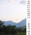 a rising hot air balloon  138257230
