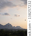 A number of hot air balloons floating 138257232